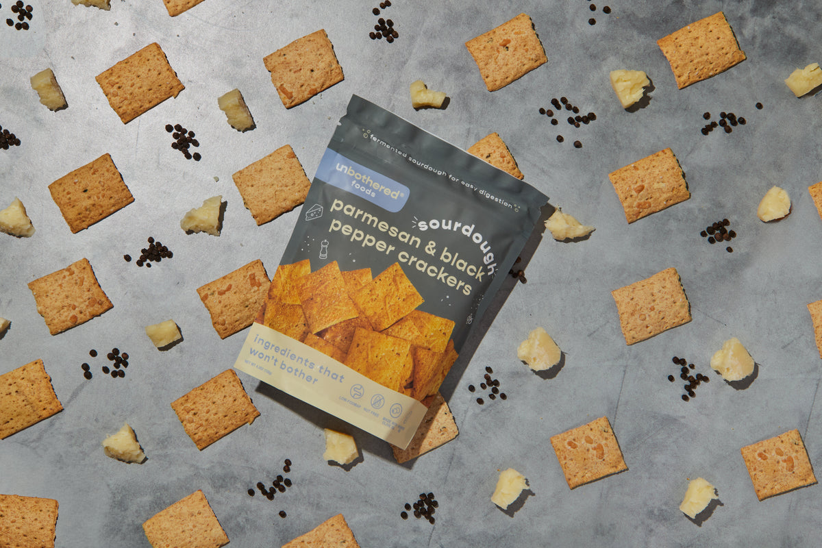 Parmesan & Black Pepper sourdough crackers on a board