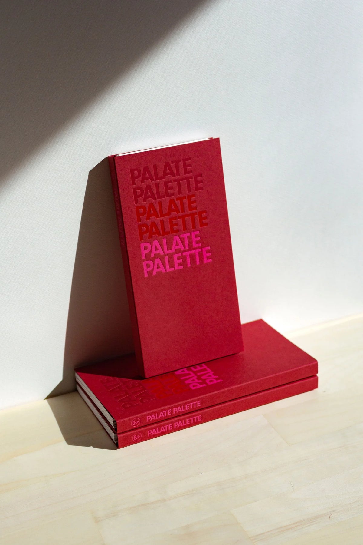 Palate Palette RED cookbook by The Taste Curators, spiral-bound with foil cover