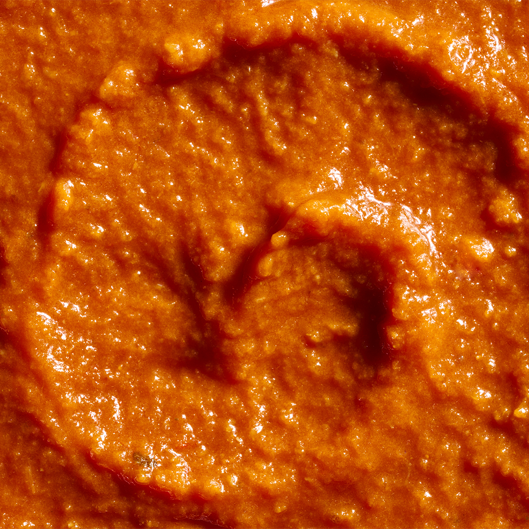 Close-up of the creamy orange-red sauce